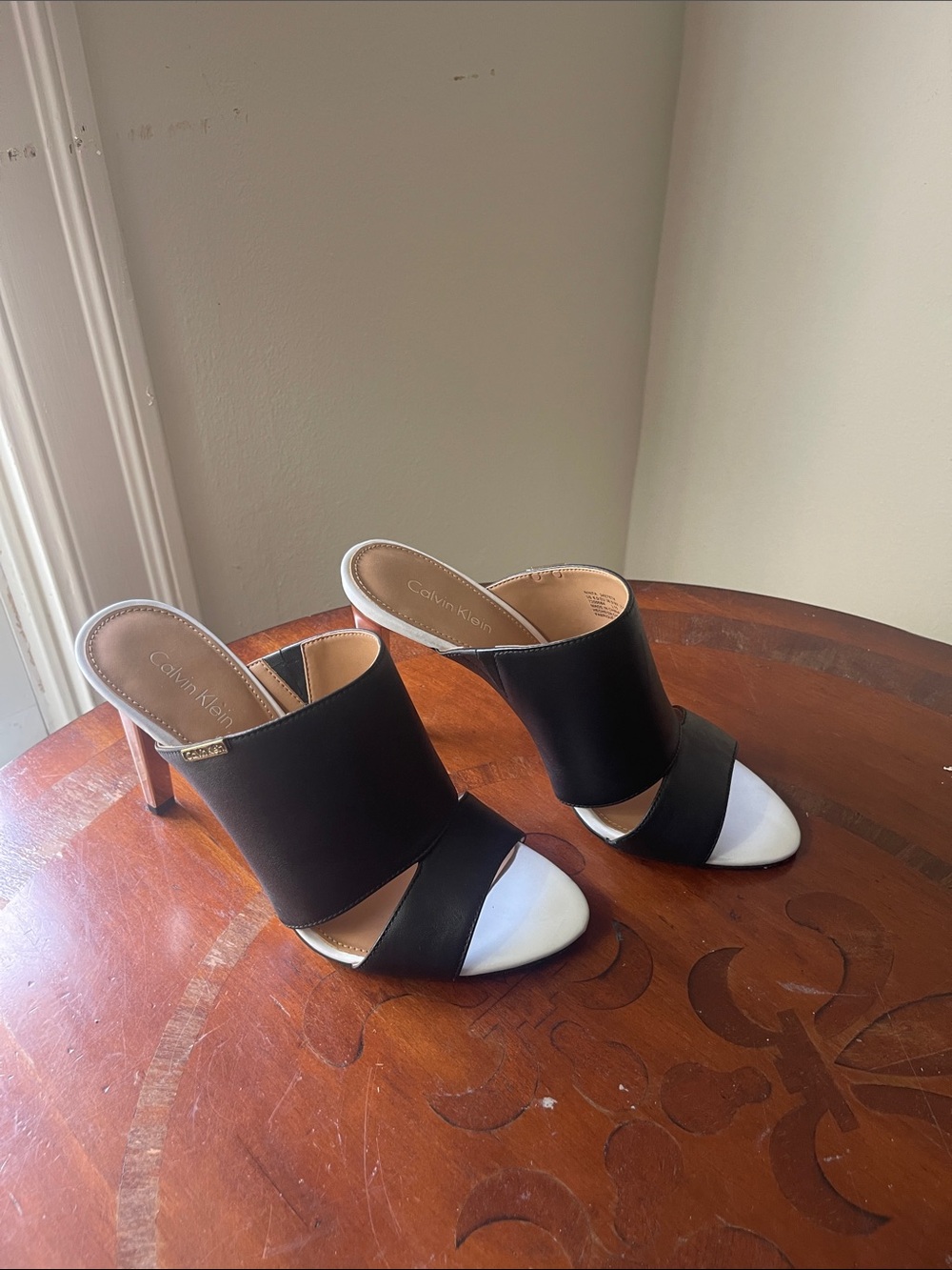 Calvin Klein Black and White Open-Toe Slide Mules